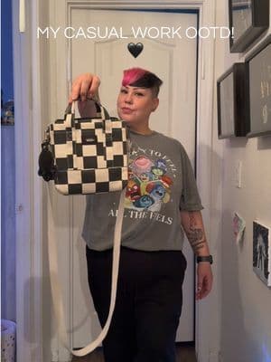 Casual work outfit of the day 🖤 Comfy but still put together. this is my go to when I need something quick, easy and still work appropriate. graphic tee paired with black basics keeps it simple, and the checkered @vans crossbody bag pulls everything together while staying hands free perfect for busy work days, running errands after work, school drop off and everything in between. this is one of those outfits that looks styled without actually taking time! #ootd #midsizefashion #vans #tiktokshopsparkcreator #greenish