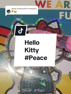 Replying to @Mistyy473 HELLO KITTY #PEACE #tiktokmademebuyit #hellokittystickerbook #sanrio #dealdrops