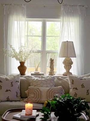 It's another rainy day today so it was a perfect morning to change things up again and to have one of my 4 candles in callab with #featheredpinesfarm on it was perfect it made our home smell like I've been baking Banana Nut Bread all morning 🍞 #candles #fyp #homedecor #cozyathome #whitecottage @target @Spade and Broom #vintage @Studio McGee Hidden candy house Blueberry Cheesecake, Maple Bourbon Apple use code EVELISSE link in my bio
